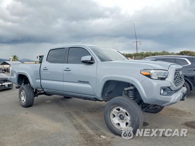 Czwarte zdjęcie samochodu z boku: 2021 TOYOTA TACOMA DOUBLE CAB VIN:3TYDZ5BN6MT002470 - miniatura