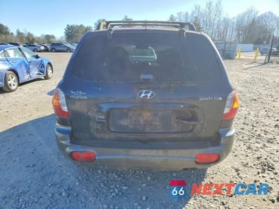 Zdjęcie 6 z 12 samochodu: 2004 HYUNDAI SANTA FE GL VIN:KM8SB12B44U686478 - miniatura