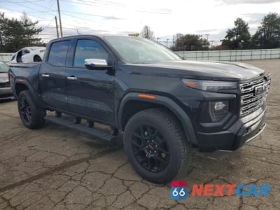 Czwarte zdjęcie samochodu z boku: 2026 GMC CANYON DENALI VIN:1GTP2FEK6T1131860 - miniatura