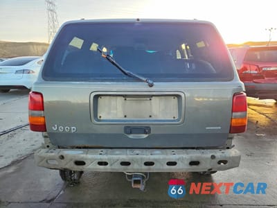 Zdjęcie 6 z 14 samochodu: 1995 JEEP GRAND CHEROKEE LAREDO VIN:1J4GZ58S2SC571119 - miniatura