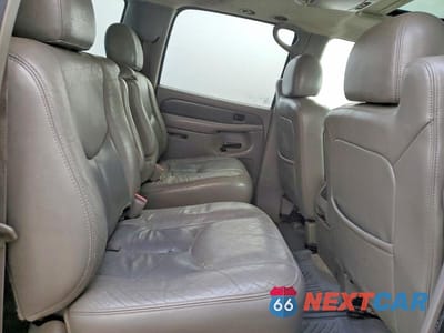 Zdjęcie 10 z 12 samochodu: 2004 GMC YUKON XL VIN:1GKFK66U64J275572 - miniatura