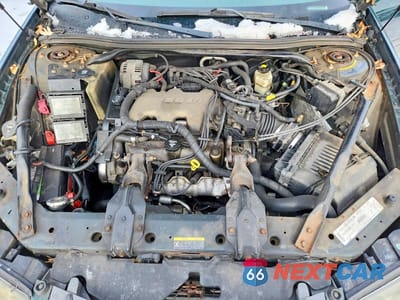 Zdjęcie 11 z 12 samochodu: 2002 CHEVROLET IMPALA VIN:2G1WF52EX29255349 - miniatura