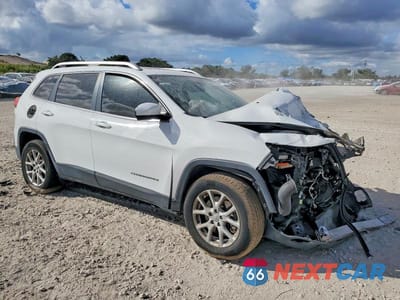 Czwarte zdjęcie samochodu z boku: 2015 JEEP CHEROKEE LATITUDE VIN:1C4PJMCS2FW789614 - miniatura