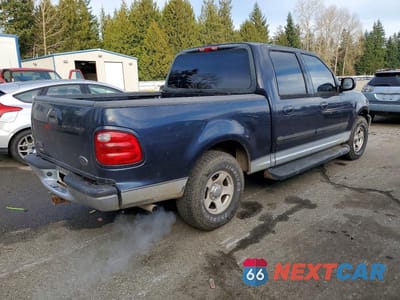 Trzecie zdjęcie samochodu z tyłu: 2001 FORD F150 SUPERCREW VIN:1FTRW07LX1KC32150 - miniatura