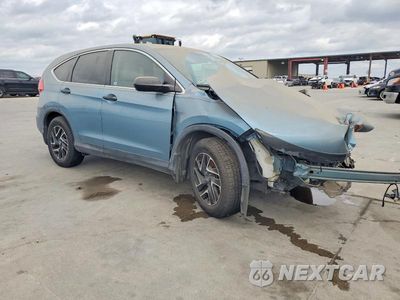 Czwarte zdjęcie samochodu z boku: 2016 HONDA CR-V SE VIN:2HKRM3H41GH518846 - miniatura