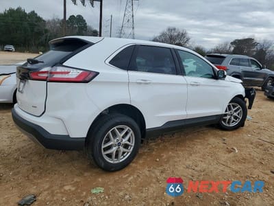 Trzecie zdjęcie samochodu z tyłu: 2022 FORD EDGE SEL VIN:2FMPK4J91NBA41218 - miniatura