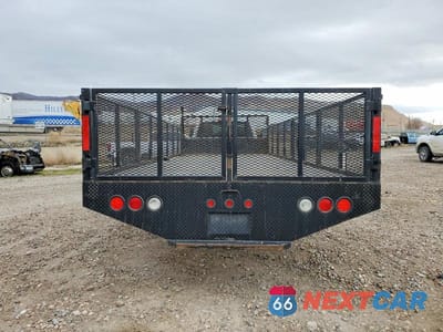 Zdjęcie 11 z 14 samochodu: 2022 RAM 3500 FLATBED TRUCK VIN:3C7WRTBL5NG421162 - miniatura