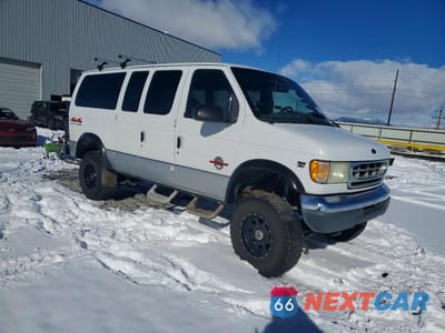 Czwarte zdjęcie samochodu z boku: 2002 FORD ECONOLINE E350 SUPER DUTY WAGON VIN:1FMNE31F02HB58625 - miniatura