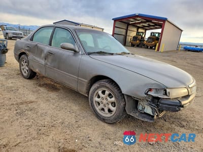 Czwarte zdjęcie samochodu z boku: 1997 MAZDA 626 ES VIN:1YVGE22D4V5633245 - miniatura