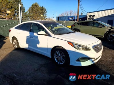 Czwarte zdjęcie samochodu z boku: 2016 HYUNDAI SONATA SE VIN:5NPE24AF9GH300322 - miniatura