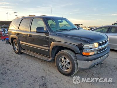 Czwarte zdjęcie samochodu z boku: 2002 CHEVROLET TAHOE C1500 VIN:1GNEC13Z72J155436 - miniatura