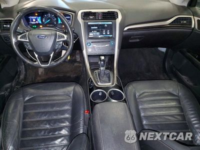 Zdjęcie 8 z 11 samochodu: 2013 FORD FUSION SE HYBRID VIN:3FA6P0LU3DR219034 - miniatura