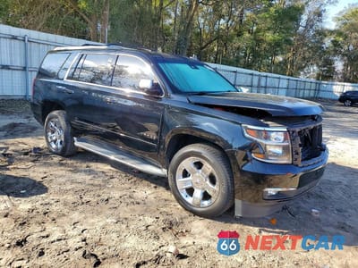 Czwarte zdjęcie samochodu z boku: 2015 CHEVROLET TAHOE K1500 LTZ VIN:1GNSKCKC0FR646663 - miniatura