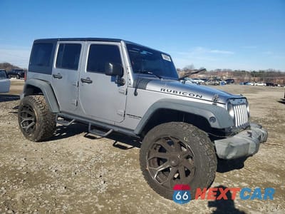 Czwarte zdjęcie samochodu z boku: 2016 JEEP WRANGLER UNLIMITED RUBICON VIN:1C4BJWFG9GL205547 - miniatura