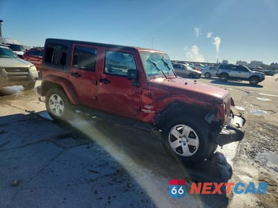 Czwarte zdjęcie samochodu z boku: 2012 JEEP WRANGLER UNLIMITED SAHARA VIN:1C4BJWEGXCL173008 - miniatura