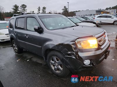 Czwarte zdjęcie samochodu z boku: 2010 HONDA PILOT EXL VIN:5FNYF4H53AB035482 - miniatura