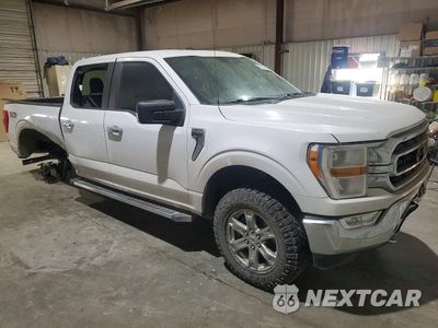 Czwarte zdjęcie samochodu z boku: 2021 FORD F150 SUPERCREW VIN:1FTFW1E54MKD75127 - miniatura