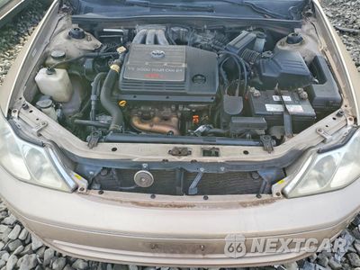 Zdjęcie 11 z 12 samochodu: 2001 TOYOTA AVALON XL VIN:4T1BF28B91U148923 - miniatura