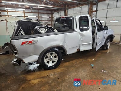 Trzecie zdjęcie samochodu z tyłu: 2003 FORD F150 VIN:2FTRX18L93CA15858 - miniatura