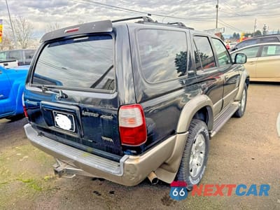 Czwarte zdjęcie samochodu z boku: 1999 TOYOTA 4RUNNER LIMITED VIN:JT3HN87R9X0239892 - miniatura