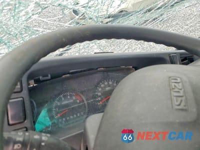 Zdjęcie 9 z 11 samochodu: 2019 ISUZU NPR HD CREW CAB FLATBED TRUCK VIN:54DC4J1B4KS808605 - miniatura