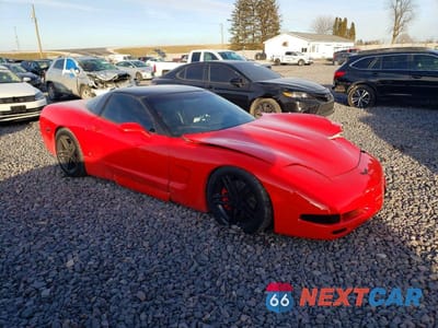 Czwarte zdjęcie samochodu z boku: 2002 CHEV CORVETTE VIN:1G1YY22G125120258 - miniatura