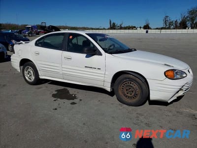 Czwarte zdjęcie samochodu z boku: 2000 PONTIAC GRAND AM SE VIN:1G2NE52TXYM879883 - miniatura