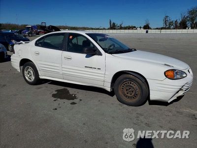 Czwarte zdjęcie samochodu z boku: 2000 PONTIAC GRAND AM SE VIN:1G2NE52TXYM879883 - miniatura