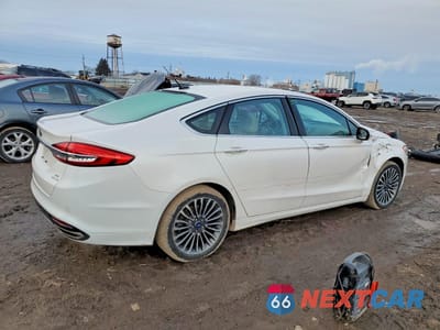 Trzecie zdjęcie samochodu z tyłu: 2017 FORD FUSION SE VIN:3FA6P0H96HR187710 - miniatura