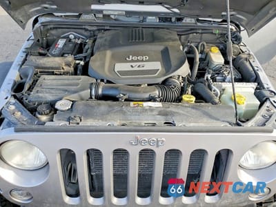 Zdjęcie 12 z 12 samochodu: 2014 JEEP WRANGLER UNLIMITED SAHARA VIN:1C4BJWEGXEL186926 - miniatura