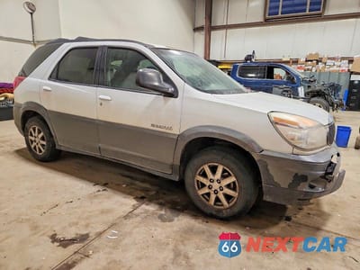 Czwarte zdjęcie samochodu z boku: 2003 BUICK RENDEZVOUS CX VIN:3G5DA03E23S568910 - miniatura