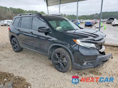 Czwarte zdjęcie samochodu z boku: 2021 HONDA PASSPORT ELITE VIN:5FNYF8H00MB012127 - miniatura