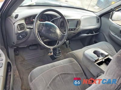 Zdjęcie 8 z 12 samochodu: 1999 FORD F150 VIN:1FTRX18W4XKA81925 - miniatura