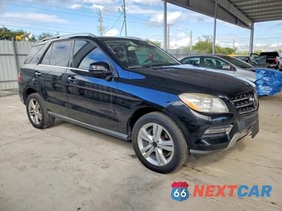 Czwarte zdjęcie samochodu z boku: 2014 MERCEDES-BENZ ML 350 VIN:4JGDA5JB9EA440369 - miniatura