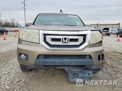 Piąte zdjęcie samochodu w środku: 2011 HONDA PILOT TOURING VIN:5FNYF4H94BB033549 - miniatura