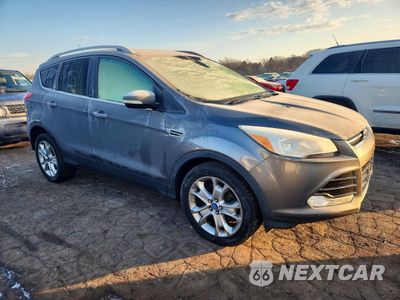 Czwarte zdjęcie samochodu z boku: 2014 FORD ESCAPE TITANIUM VIN:1FMCU9JX6EUA18225 - miniatura