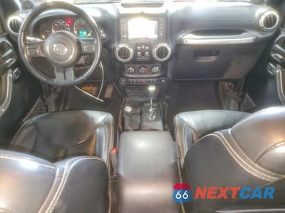 Zdjęcie 8 z 11 samochodu: 2014 JEEP WRANGLER UNLIMITED SAHARA VIN:1C4HJWEG0EL174181 - miniatura