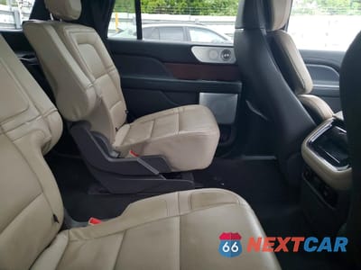 Zdjęcie 11 z 13 samochodu: 2023 LINCOLN NAVIGATOR RESERVE VIN:5LMJJ2LGXPEL10846 - miniatura