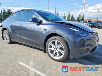Czwarte zdjęcie samochodu z boku: 2024 TESLA MODEL Y VIN:7SAYGDEE5RA264419 - miniatura