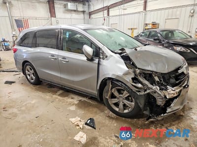 Czwarte zdjęcie samochodu z boku: 2019 HONDA ODYSSEY EXL VIN:5FNRL6H73KB104439 - miniatura