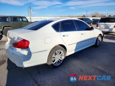 Trzecie zdjęcie samochodu z tyłu: 2010 INFINITI M35 BASE VIN:JN1CY0AR5AM961340 - miniatura