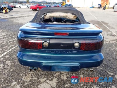 Zdjęcie 6 z 11 samochodu: 1997 PONTIAC GRAND AM VIN:2G2FV32P4V2205385 - miniatura