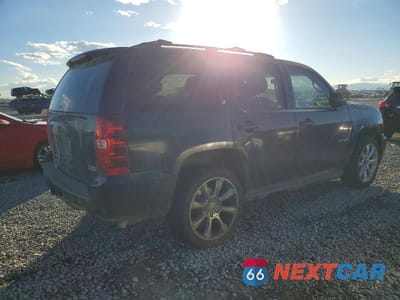 Trzecie zdjęcie samochodu z tyłu: 2010 CHEVROLET TAHOE K1500 LT VIN:1GNUKBE05AR218312 - miniatura