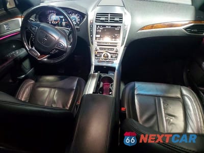 Zdjęcie 8 z 11 samochodu: 2017 LINCOLN MKZ SELECT VIN:3LN6L5D94HR662372 - miniatura