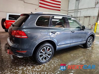 Trzecie zdjęcie samochodu z tyłu: 2011 VOLKSWAGEN TOUAREG V6 VIN:WVGFF9BP1BD000927 - miniatura