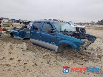 Czwarte zdjęcie samochodu z boku: 2002 FORD F350 SUPER DUTY VIN:1FTWW33F12EB01175 - miniatura