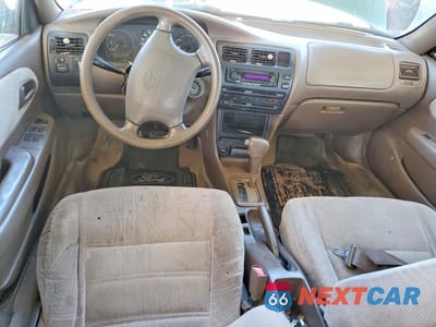 Zdjęcie 8 z 12 samochodu: 1997 TOYOTA COROLLA DX VIN:1NXBB02E2VZ505125 - miniatura