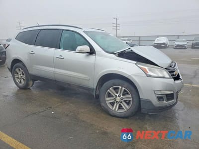 Czwarte zdjęcie samochodu z boku: 2015 CHEVROLET TRAVERSE LT VIN:1GNKVHKD7FJ272287 - miniatura