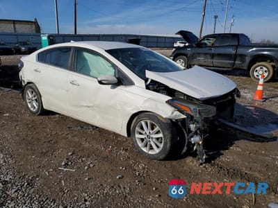 Czwarte zdjęcie samochodu z boku: 2017 KIA FORTE LX VIN:3KPFL4A70HE024239 - miniatura