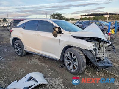 Czwarte zdjęcie samochodu z boku: 2018 LEXUS RX 450H BASE VIN:2T2BGMCA8JC026817 - miniatura